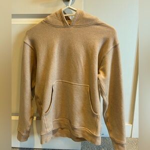 Lululemon hoodie in a pale yellow colour.